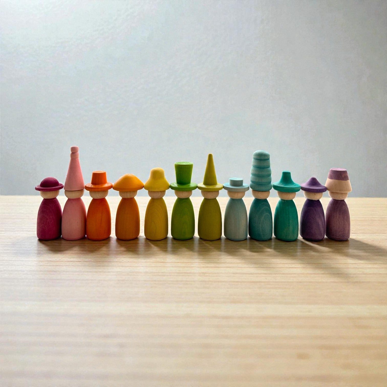 **Pre-order (Ships in 2-3 Weeks)**12 Piece Pastel Macaron Wooden Peg Dolls with Interchangeable Hats Open Ended Play Figures