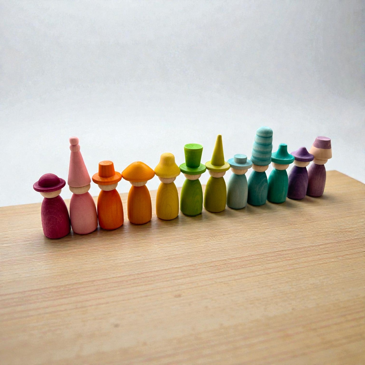 **Pre-order (Ships in 2-3 Weeks)**12 Piece Pastel Macaron Wooden Peg Dolls with Interchangeable Hats Open Ended Play Figures